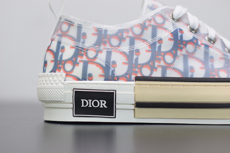 dio* b23 low-top sneaker in blue & red oblique